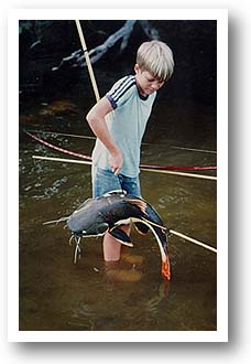 Missionary Kid Fishing. Photo copyright by J. Hill.