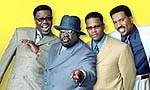 Bernie Mac, Cedric the Entertainer, D.L. Hughley and Steve Harvey in “The Original Kings of Comedy”