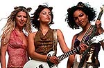 Tara Reid, Rachael Leigh Cook, and Rosario Dawson in “Josie and the Pussycats”