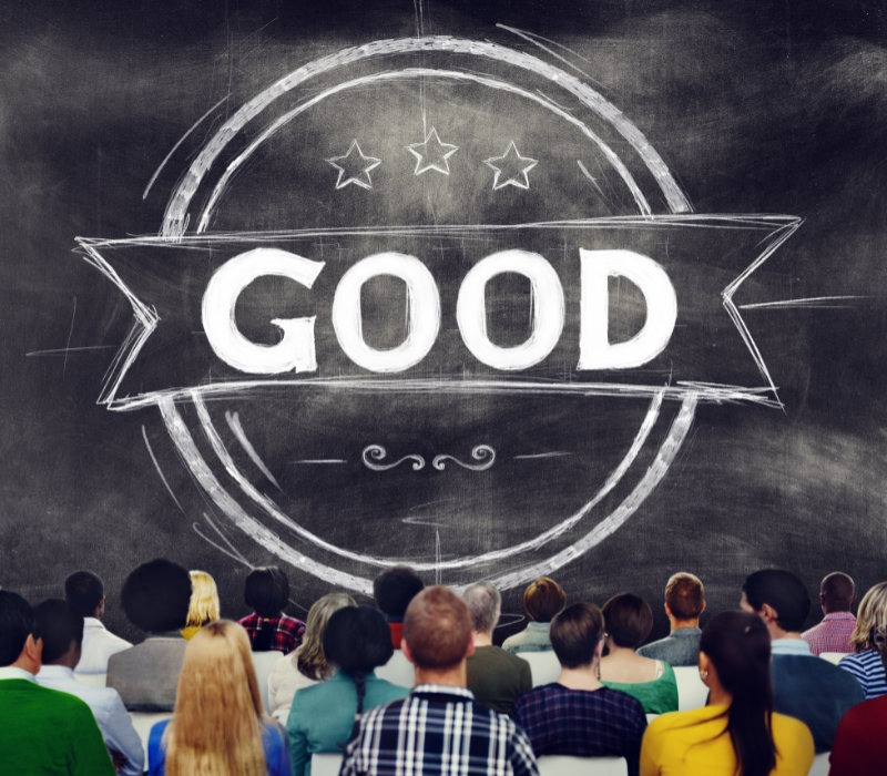 Photograph of a crowd looking at the word good. Copyrighted. Licensed (77000743).