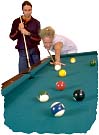 Couple playing pool. Photo copyrighted.