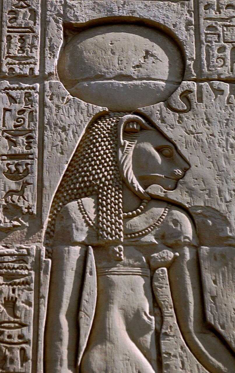 Egyptian bas-relief of lion-headed warrior goddess with sun disk on her head. Photographer Gérard Ducher (Néfermaât).