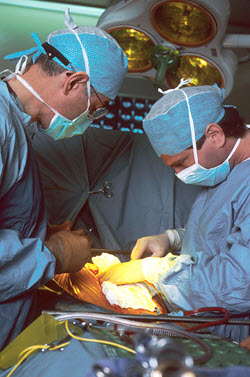Surgeons in operating room.