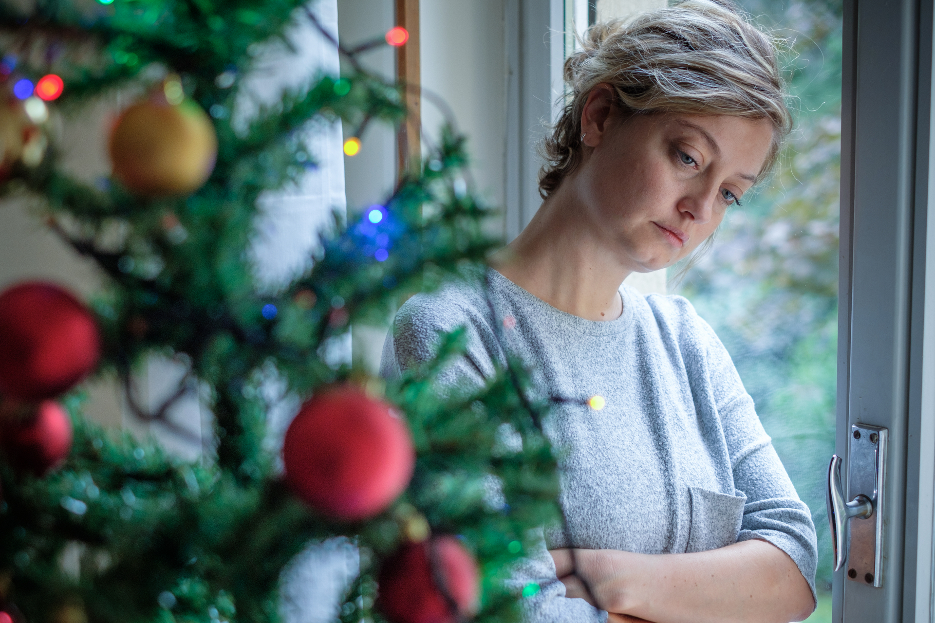 Depressed woman at Christmas time. Photo © Tommaso79. License: Shutter Stock. File ID: 1231458337