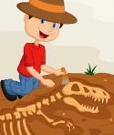 Boy digging up a dinosaur skeleton fossil