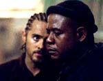 Jared Leto and Forest Whitaker in “Panic Room”