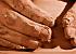 hands in clay